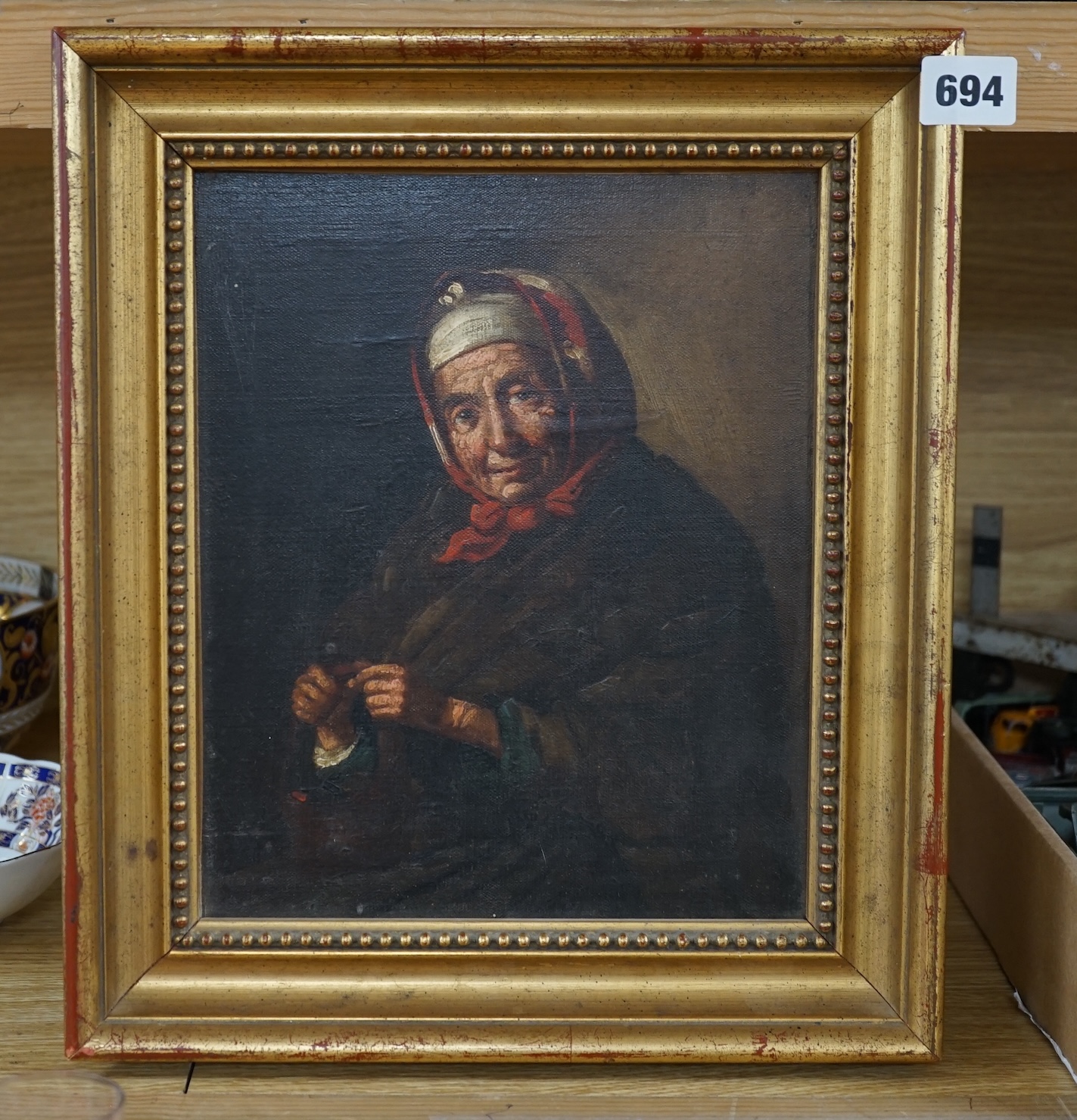 Dutch school, oil on canvas, Portrait of an elderly woman, unsigned, 26 x 21cm, gilt framed. Condition - fair